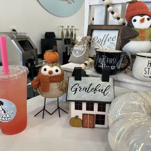 a coffee shop counter with various items