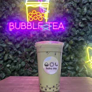 Matcha Milk Tea with strawberry popping boba