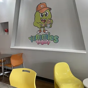 a yellow chair and a yellow table