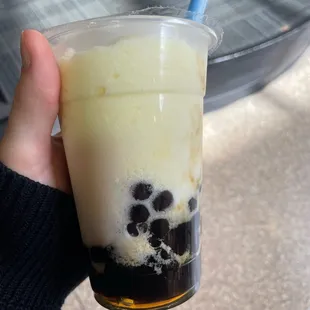 Pineapple coconut smoothie with boba