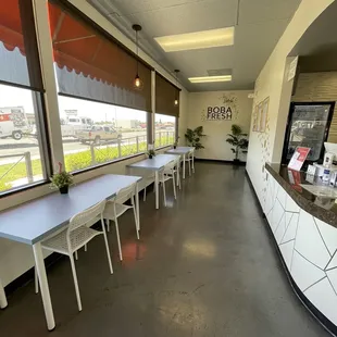 a row of tables in a restaurant
