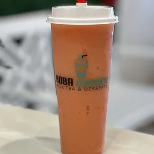 a cup of iced coffee on a table