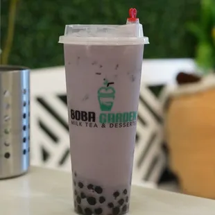 a cup of boba tea and dessert