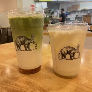 Matcha latte 24oz (left)  Pineapple Field 16oz (right)