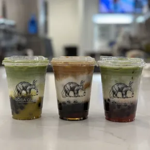Left - Right: Mango Matcha Latte, Caffe Latte, Strawberry Matcha Latte