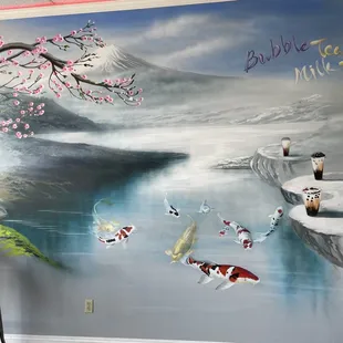 a mural of koi fish in a pond