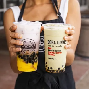 Staff holding drinks