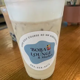 a cold drink in a plastic cup