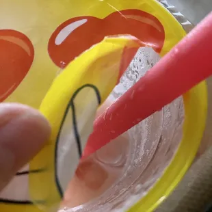 Hole I created in lid with knife to get the straw in