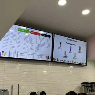 menus on the wall of a restaurant