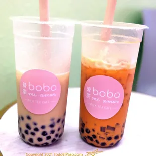 two cups of boba milk tea