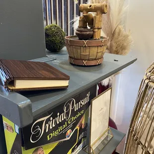 a basket of books on a shelf