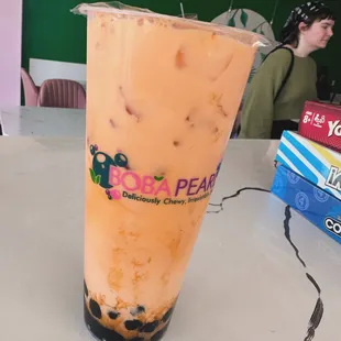 a tall glass of boba pearl