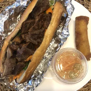 Bahn mi sandwich, an egg roll with dipping sauce