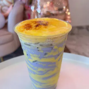 a close up of a glass of boba