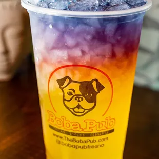  a drink in a plastic cup