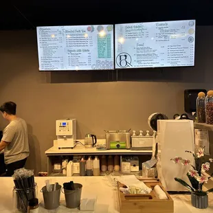 a man working at a coffee shop