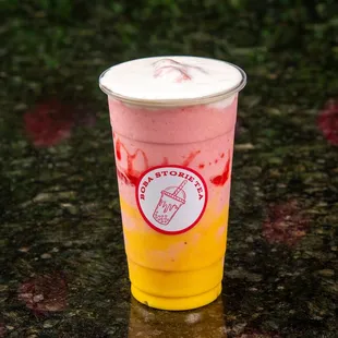 Strawberry Delight
made freshly handcrafted signature drinks, Custard, strawberry smoothie, strawberry drizzle and cheesefoam on top.