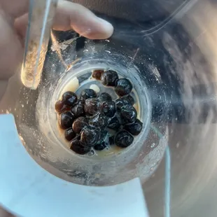 Thai tea smoothie, it was okay but this big clump on the bottom was a waste.