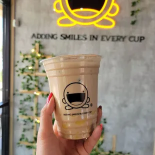 Lavender milk tea with pudding.