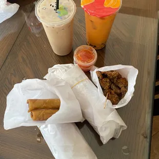 2 Bánh mì sandwiches, popcorn chicken, egg rolls and 2 drinks. Soooo gooood.