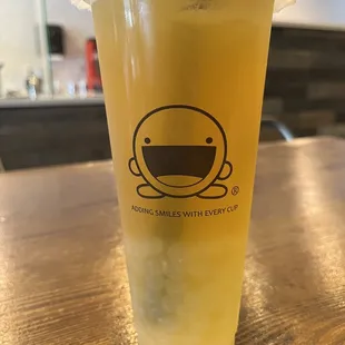 Lychee Tea with green tea and popping boba lychee