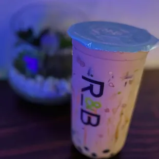 a boba tea cup and a bowl of boba tea