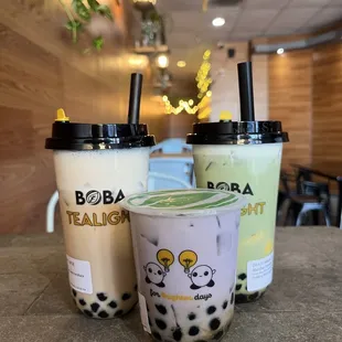 Classic Milk Tea, taro milk tea, matcha milk tea. Cheese foam on two large and black boba on all, pineapple jelly on taro!