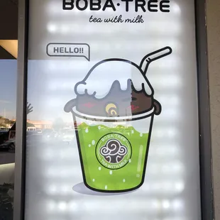 a cup of ice cream with a straw