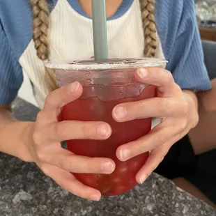 Watermelon green tea refresher with mango popping boba
