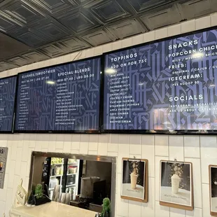 menus on a wall in a restaurant