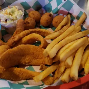 Fish tenders basket with catfish strips...hush puppies...fries...cold slaw &amp; tartor sauce $9.75.