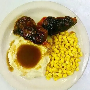$7.95 lunch special pork shanks mashed potatoes brown gravy and corn
