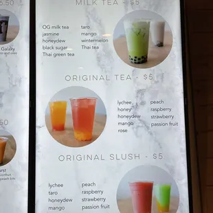 a menu for drinks on a table