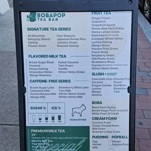 Sandwich sign of the menu outside the shop.