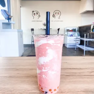 Strawberry smoothie with mango poppers