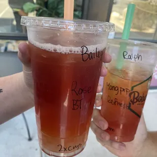 Black tea Rose with crystal boba  Mango prickly pear refresher with Pom popping boba.