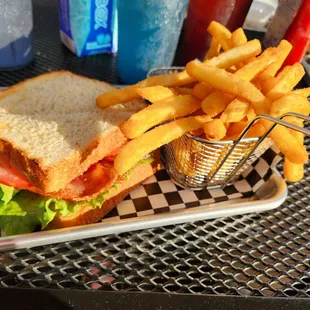 a sandwich and fries