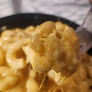 Mac n cheese. Look at that cheese pull