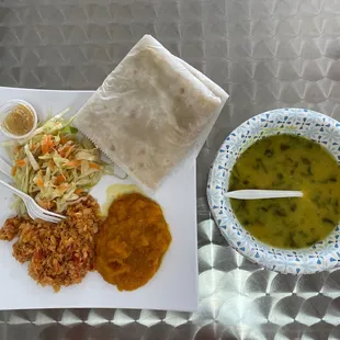 Saltfish with cabbage, pumpkin, roti and Dahl