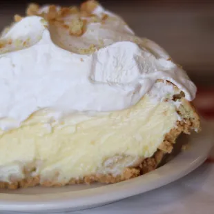 a slice of pie with whipped cream