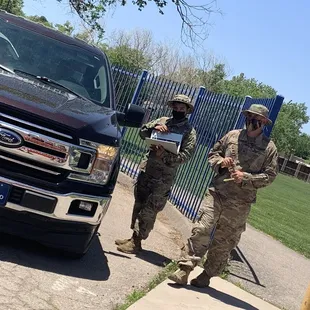 New Mexico Nation Guard working  the drive-thru Covid-19 event in ABQ