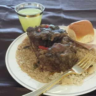 Oxtail plate with glass of nicely complex lemonade.