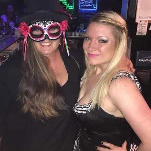 two women dressed up for a party