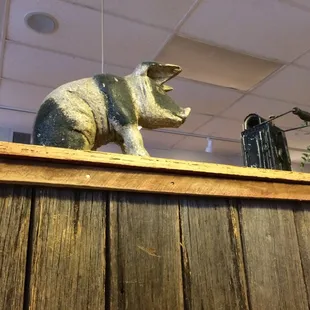 a statue of a bear on top of a table