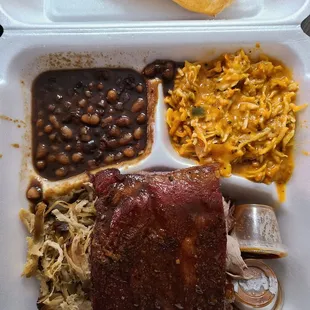 a meal in a styrofoam container