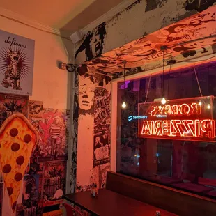 More indoor seating and neon sign