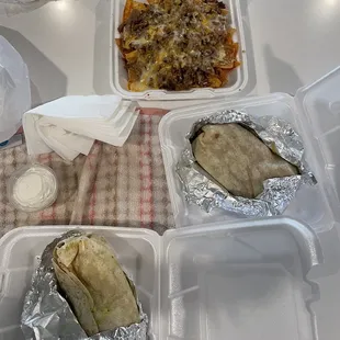 Shrimp burrito, chicken Monster Burrito, and Nachos Grande