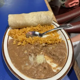 Kids plate. Chicken burrito, rice, and beans.