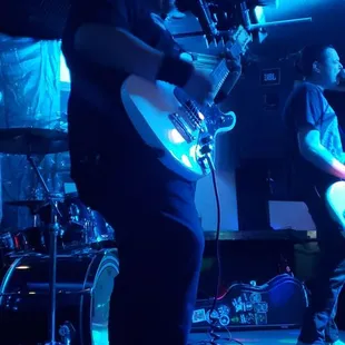 a band playing on stage